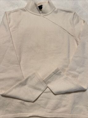 Tracy M Cream Mock Neck Sweater72% silk combined with angora and nylon.